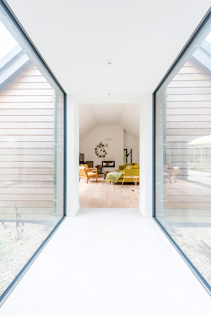 glass link corridor connecting cottage to new extension