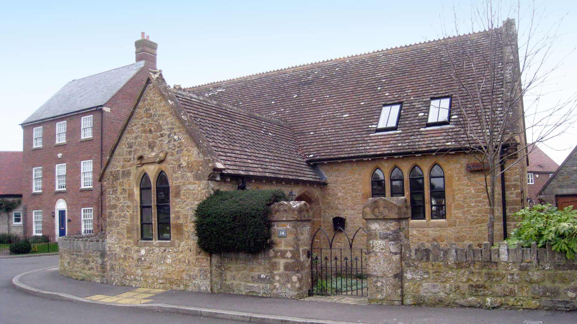 school conversion stone building with skylight roof windows