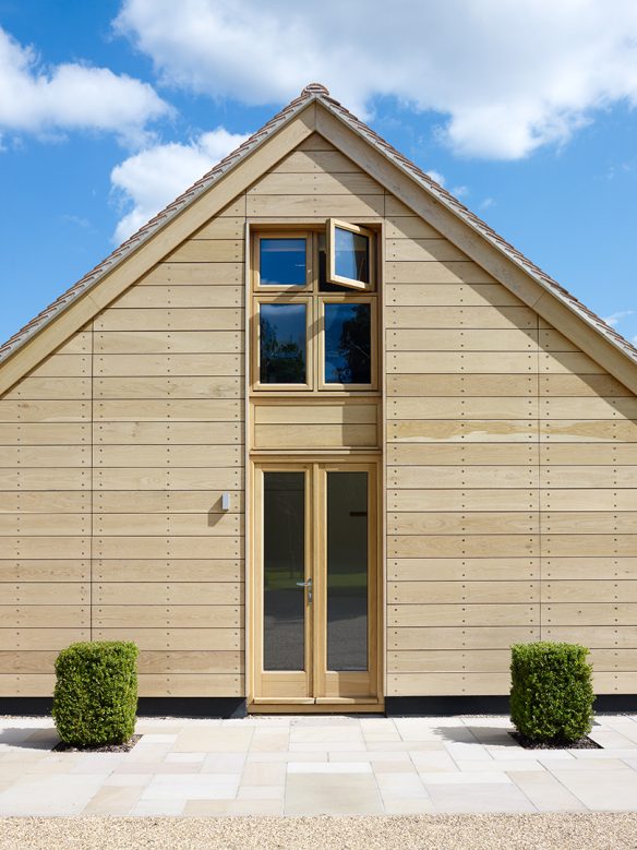 front entrance of outbuilding with timber clad