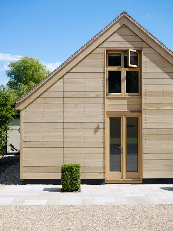 front entrance of outbuilding with timber clad