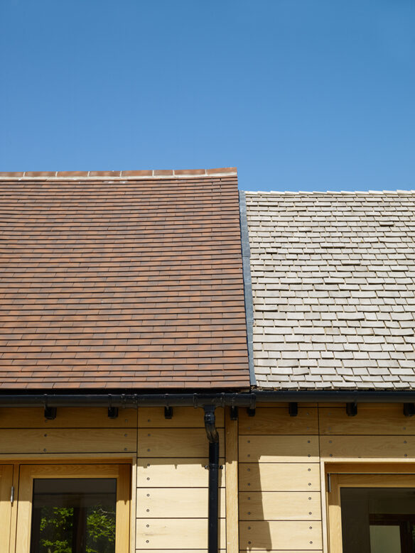 detail view of tiled roof at two different heights
