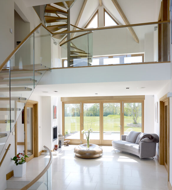 entrance and living double height area with staircase and mezzanine level