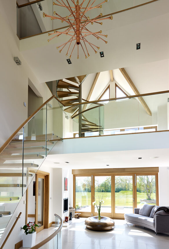 entrance and living double height area with staircase and mezzanine level