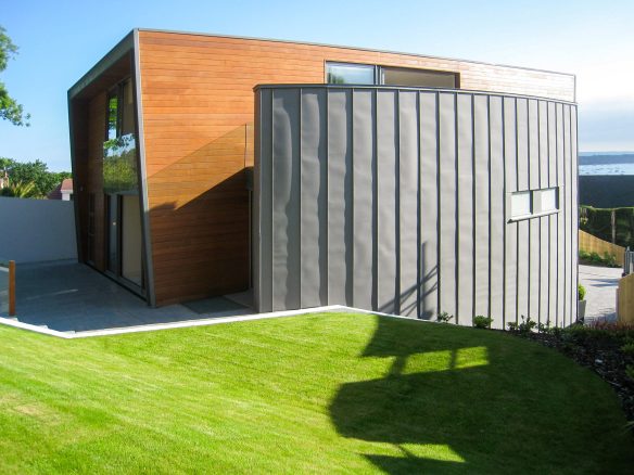 contemporary house with sea view and curved zinc wall