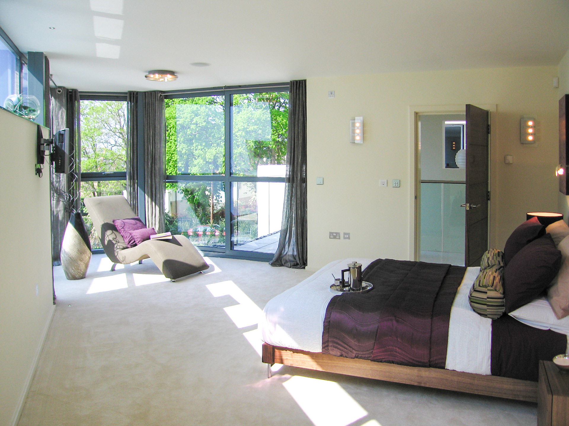interior bedroom with double aspect feature corner window