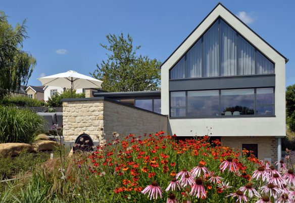 exterior rear view of house with glazed gable