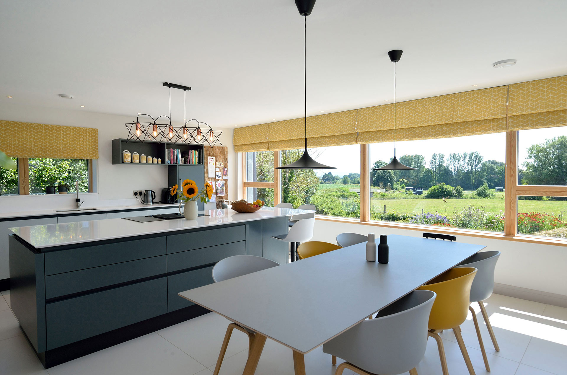 modern kitchen dining area with yellow tones