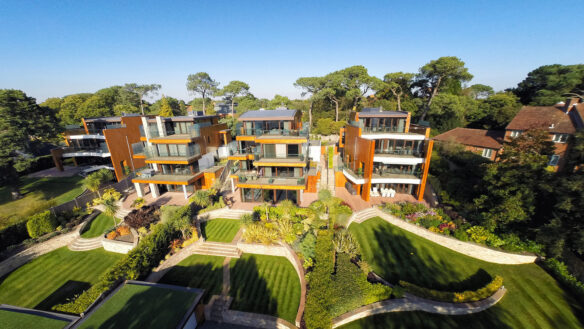 aerial view of four contemporary houses with terraced gardens