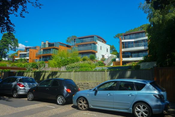 view of contemporary houses from road