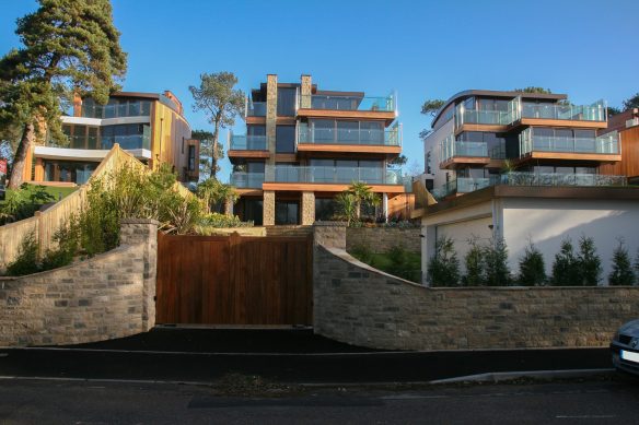 view of contemporary houses from road