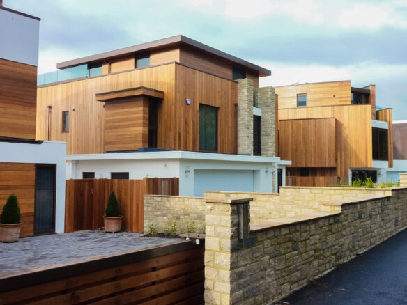 front view of houses with linear design and timber cladding