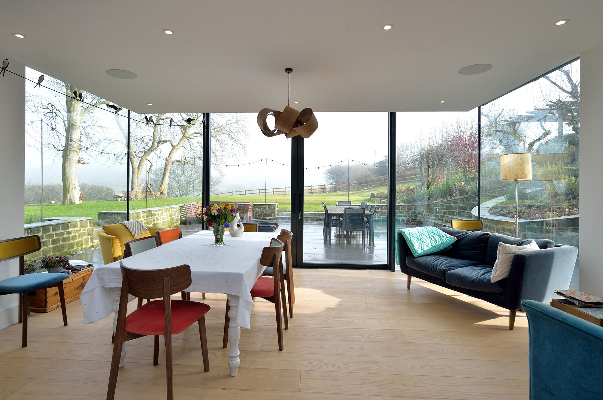 interior of dining room extension looking out to terrace patio