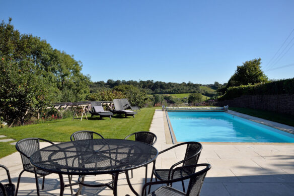 rear garden with swimming pool overlooking countryside