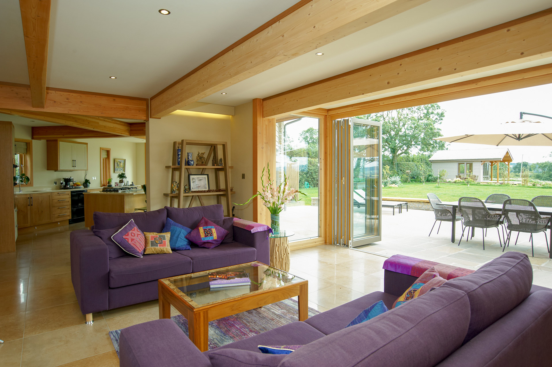 inside living area with sliding doors leading to outside dining area