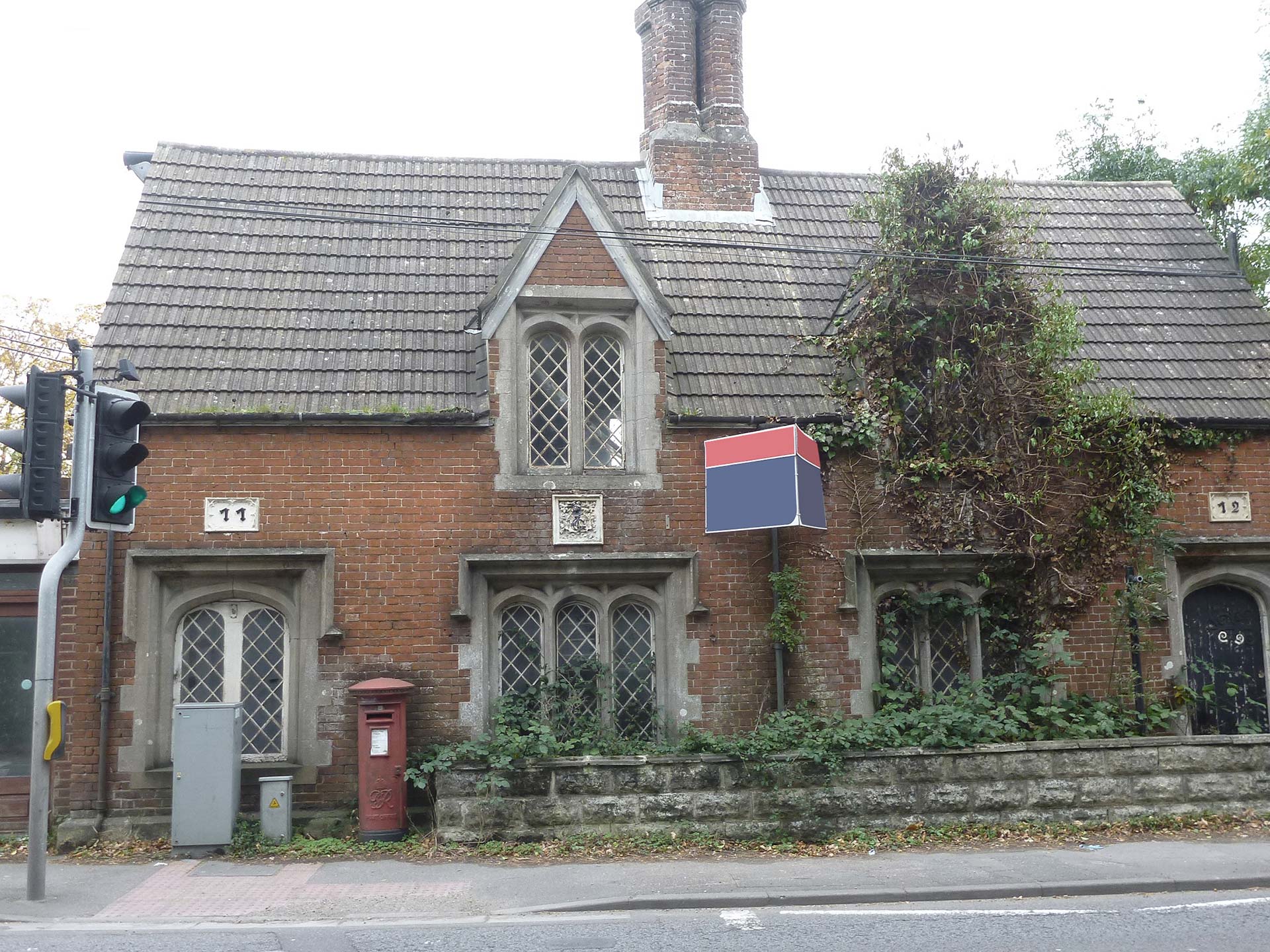 before photo, front view of old red brick post office