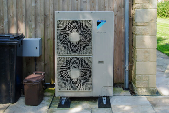 air source heat pump on side of house