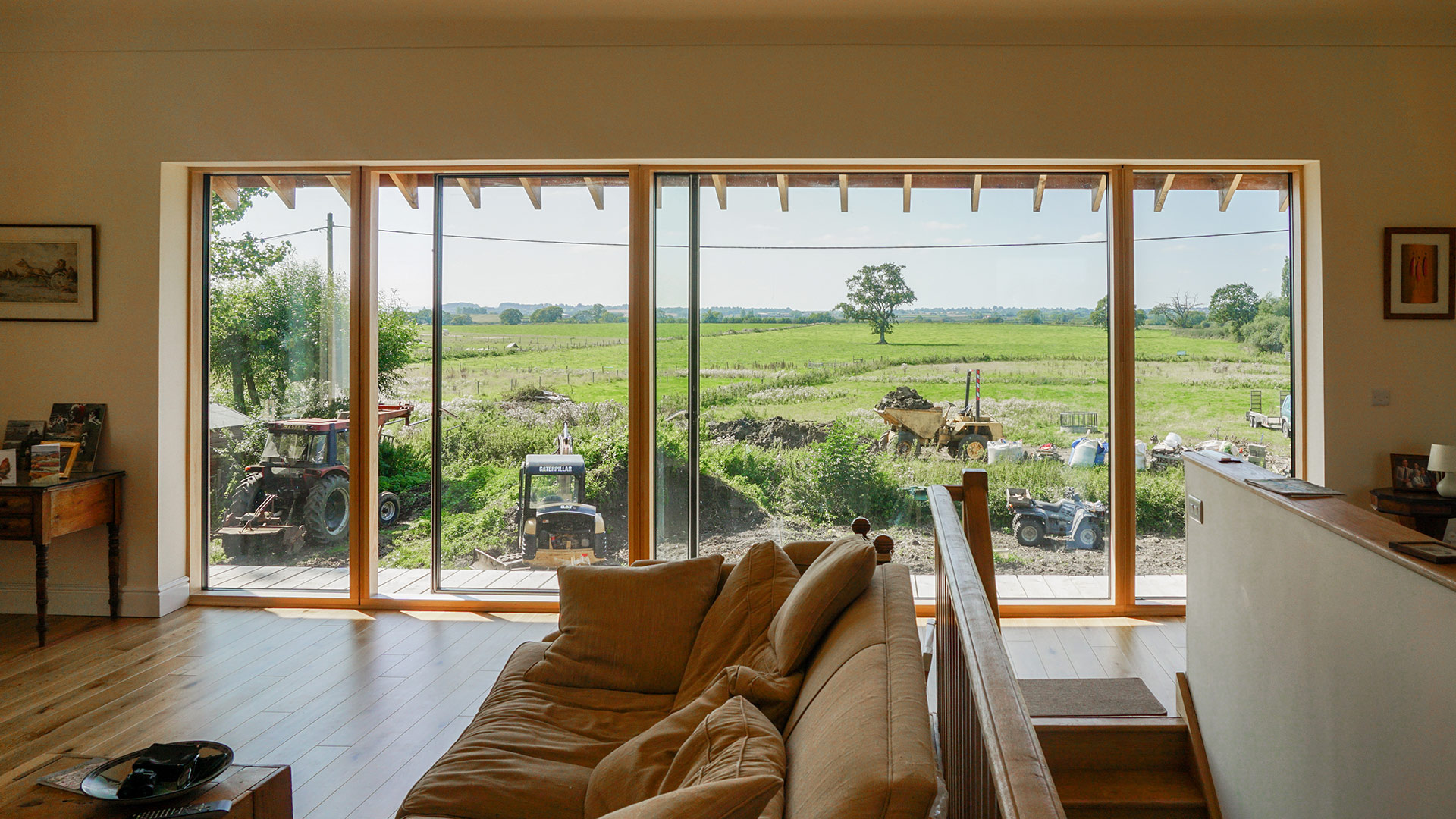 first floor living area with large window with countryside views