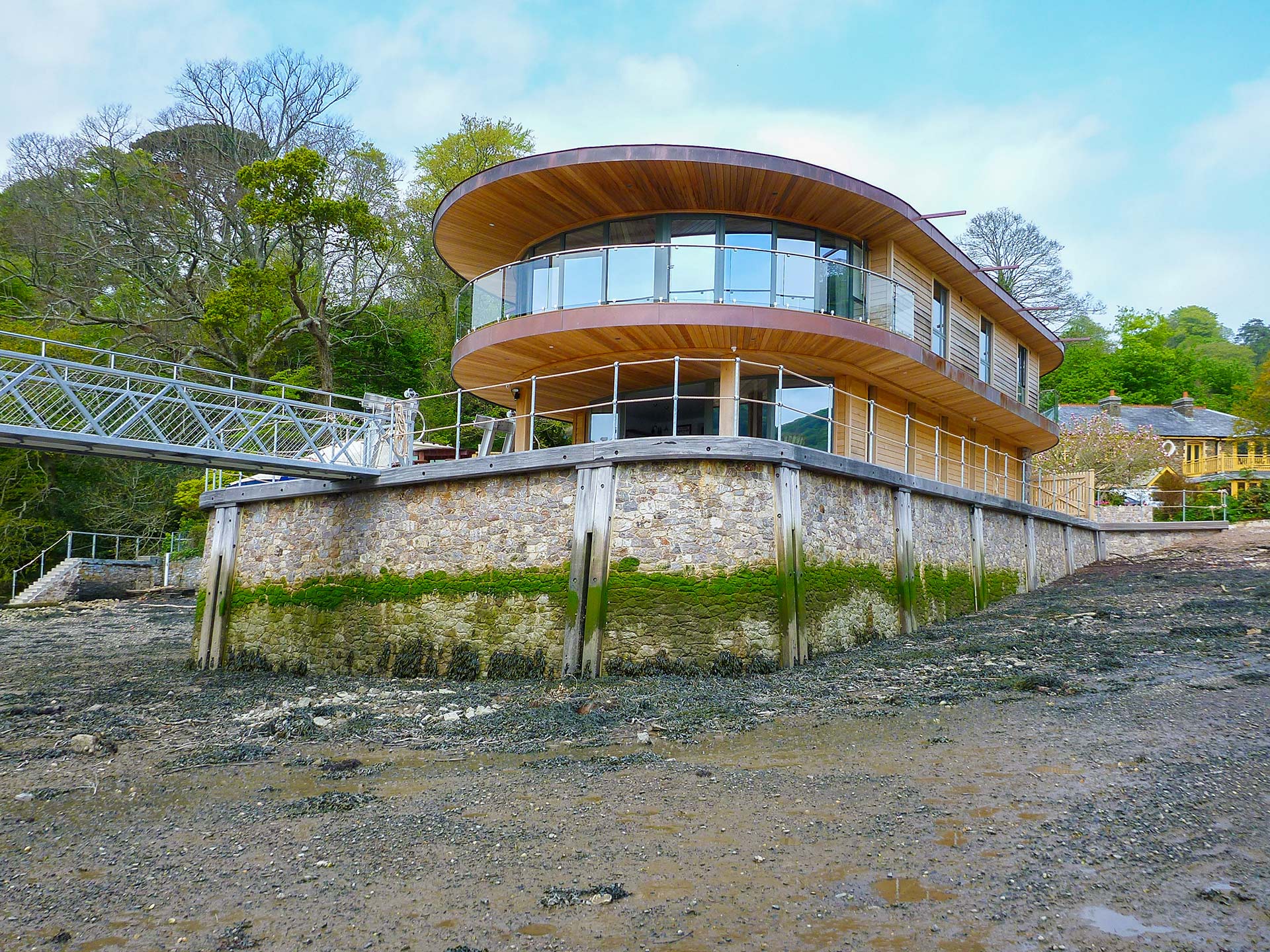 riverside house with stone plinth