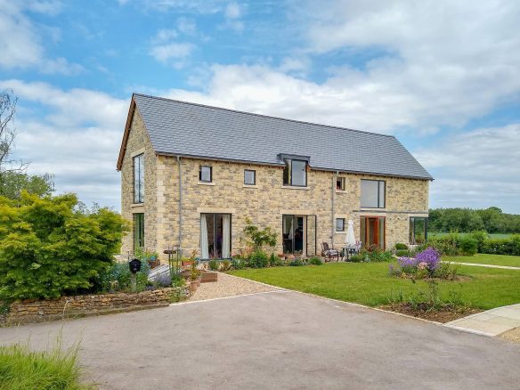 front view of stone house from driveway