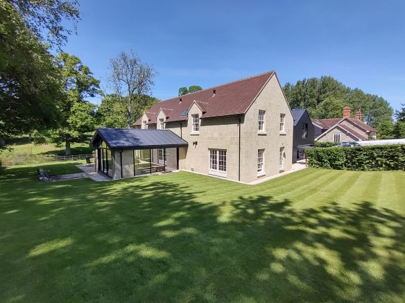 modern house with extension and large garden