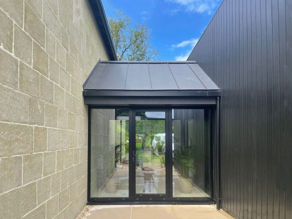 main entrance and connecting glass link in-between two buildings