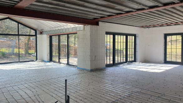 unfloor heating being installed in large living area