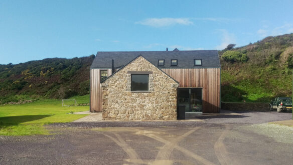 entrance approach to house with stone and timber cladding