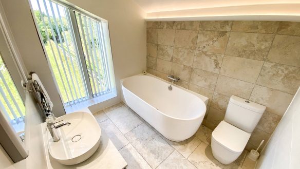 modern bathroom with slanting roof