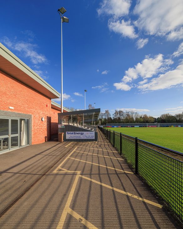 football club with pitch and seating stands