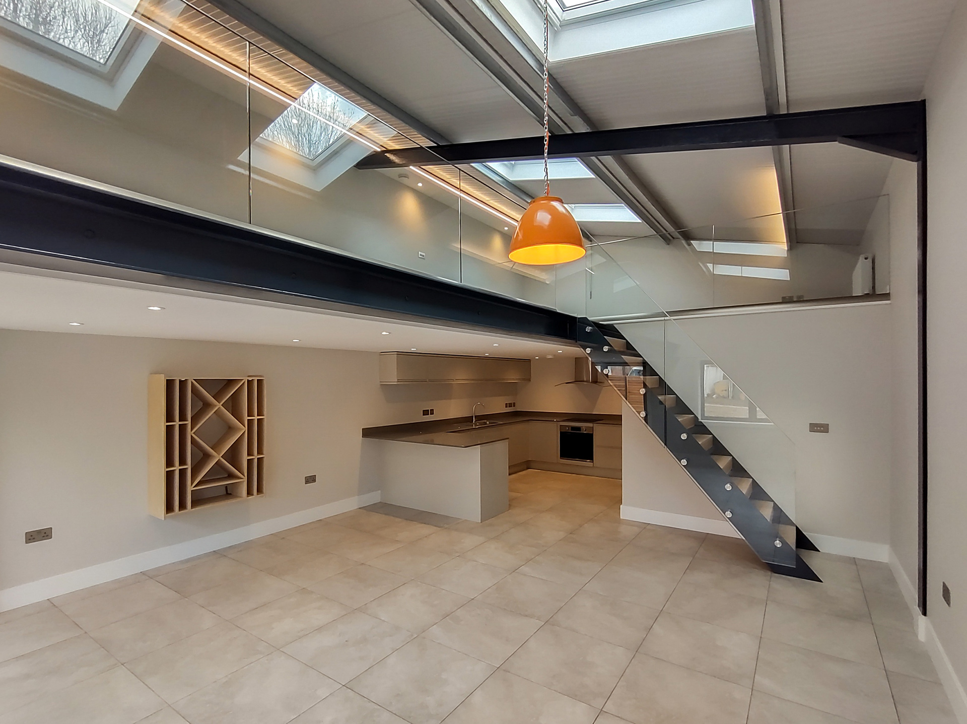 internal living space in barn conversion with large open mezzanine level