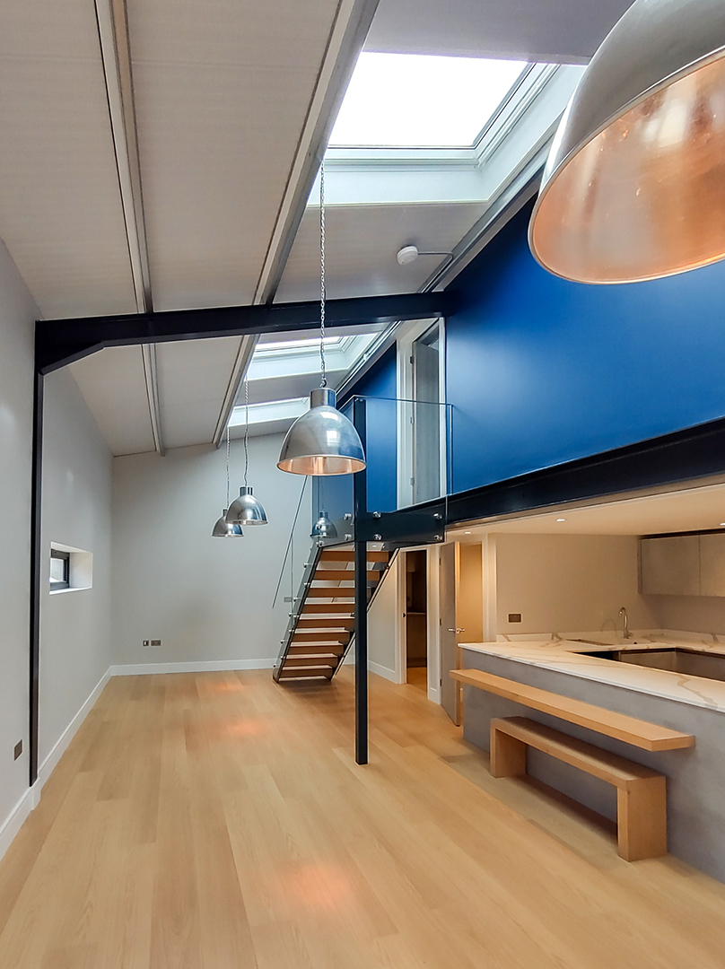 open plan kitchen with staircase to first floor