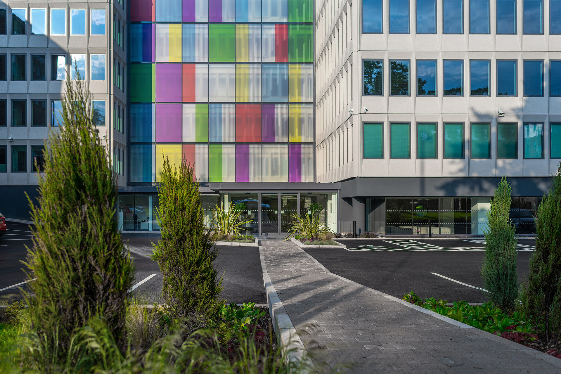 entrance to reception area of office building including path from car park to reception