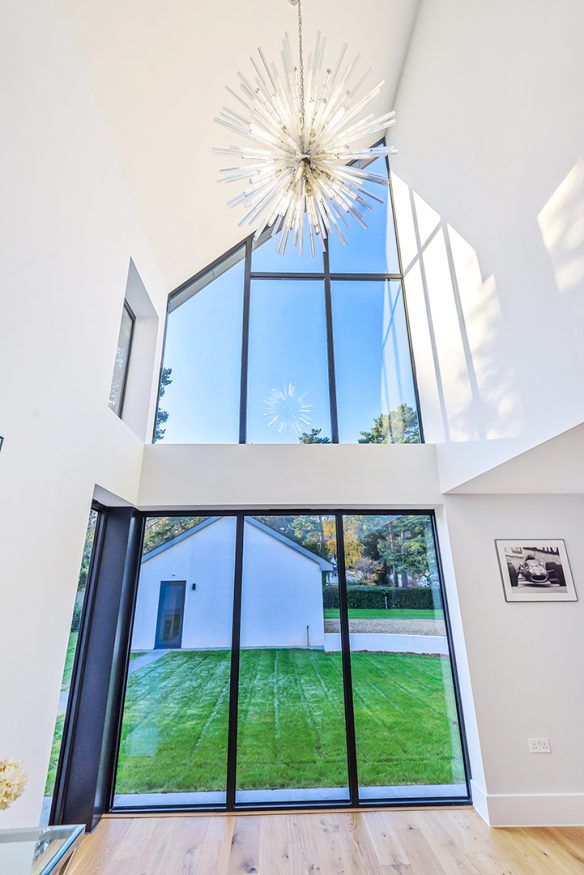feature window with double aspect and double height in contemporary house