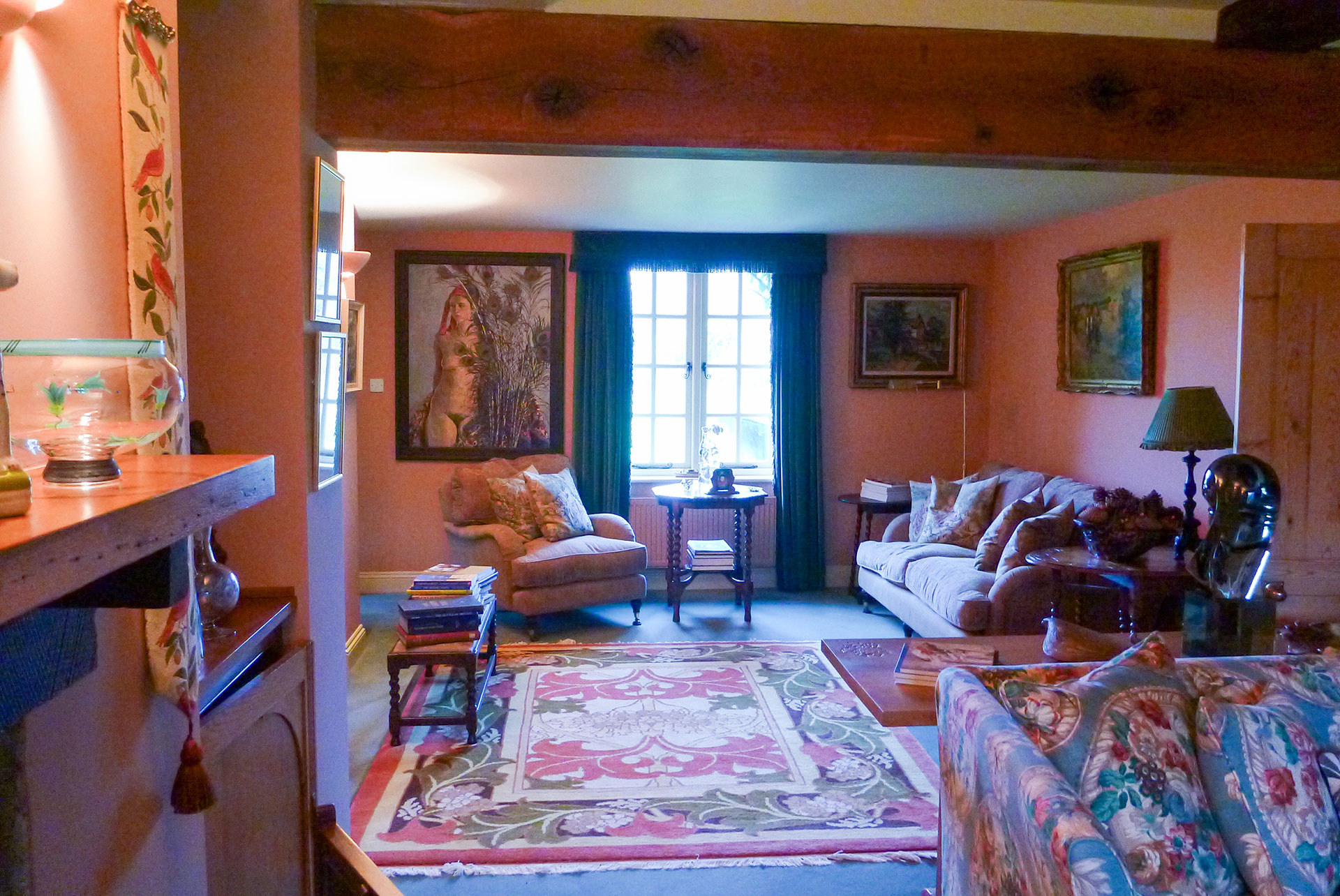 interior living room with warm earthy tones and exposed wooden beam