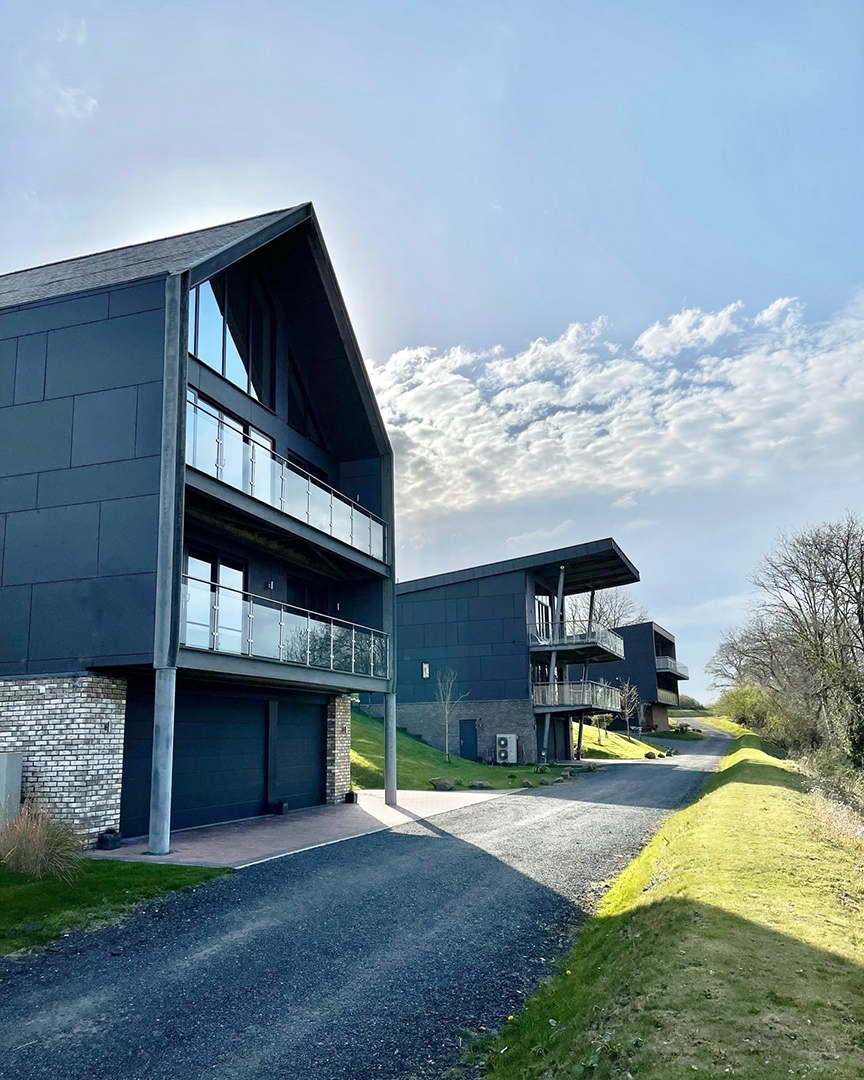 approach view of modern houses with balconies