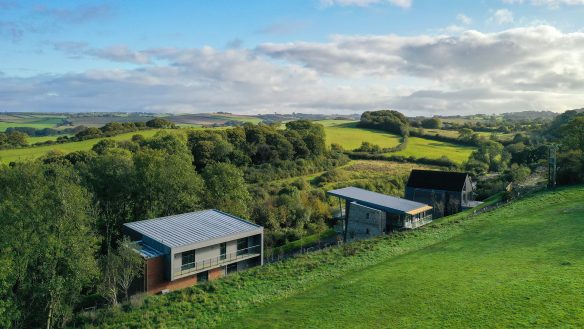 contemporary houses with different style roofs with beautiful countryside views