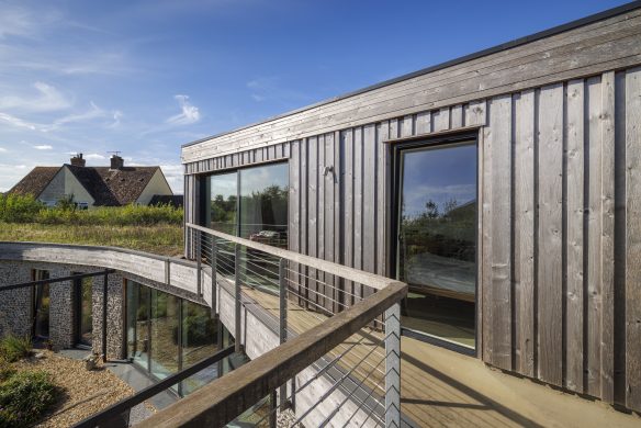 detailed view of wooden cladding on house and balcony