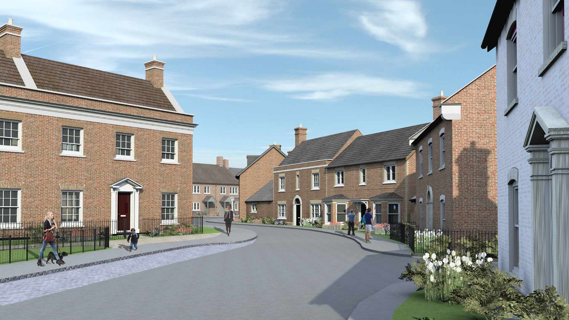 street scene visual of red brick housing along curved road