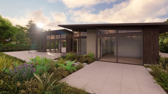 rear elevation of house and garden patio at dusk