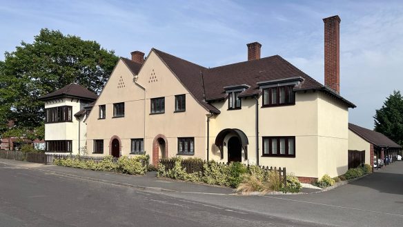 street view of housing with arch design doors