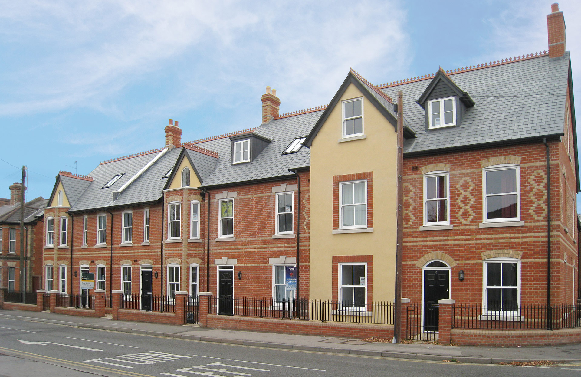 Attractive brick townhouses from road