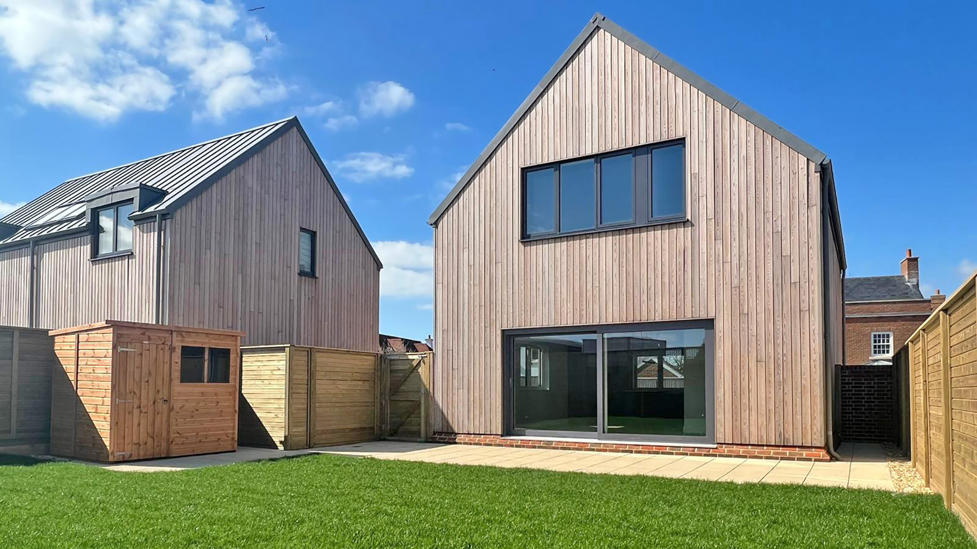 garden view of modern house with timber cladding