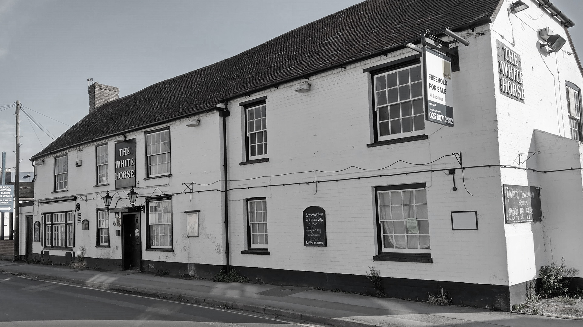 before photo of front view of pub from street view