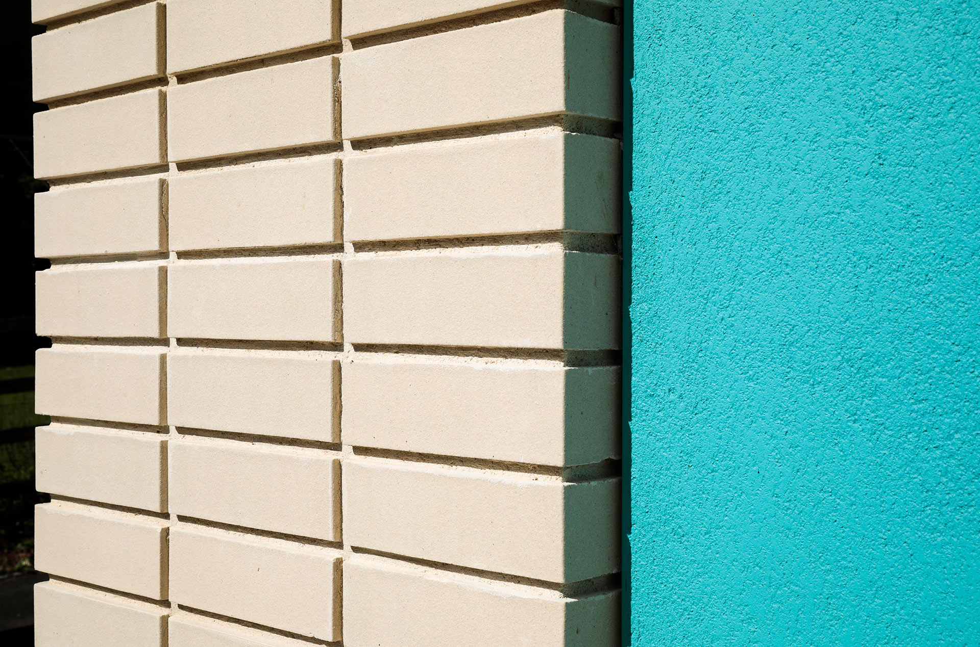 brick detail on wall with blue paint