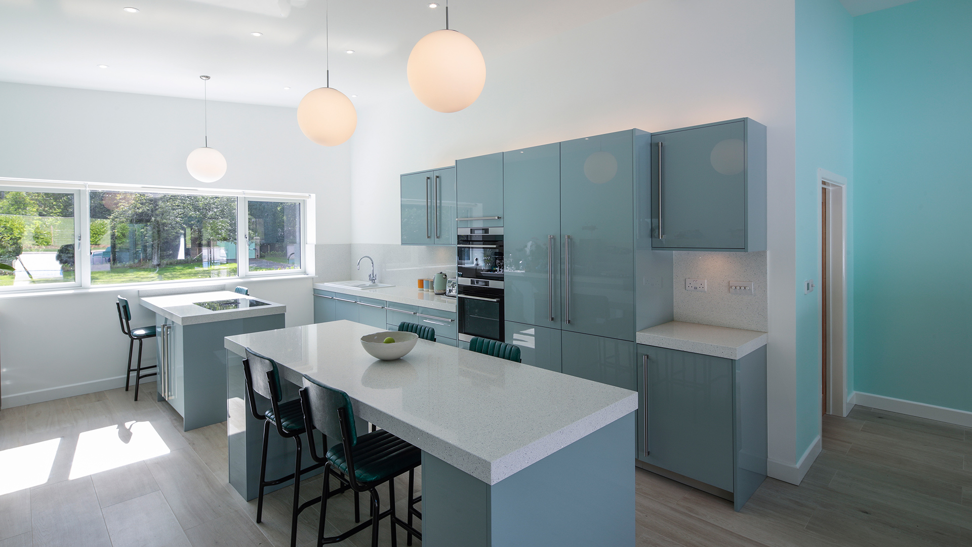 modern kitchen with blue tones and kitchen island