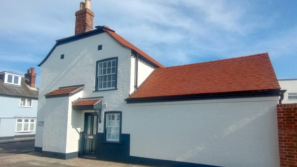 Side view of converted brick pub to residential house