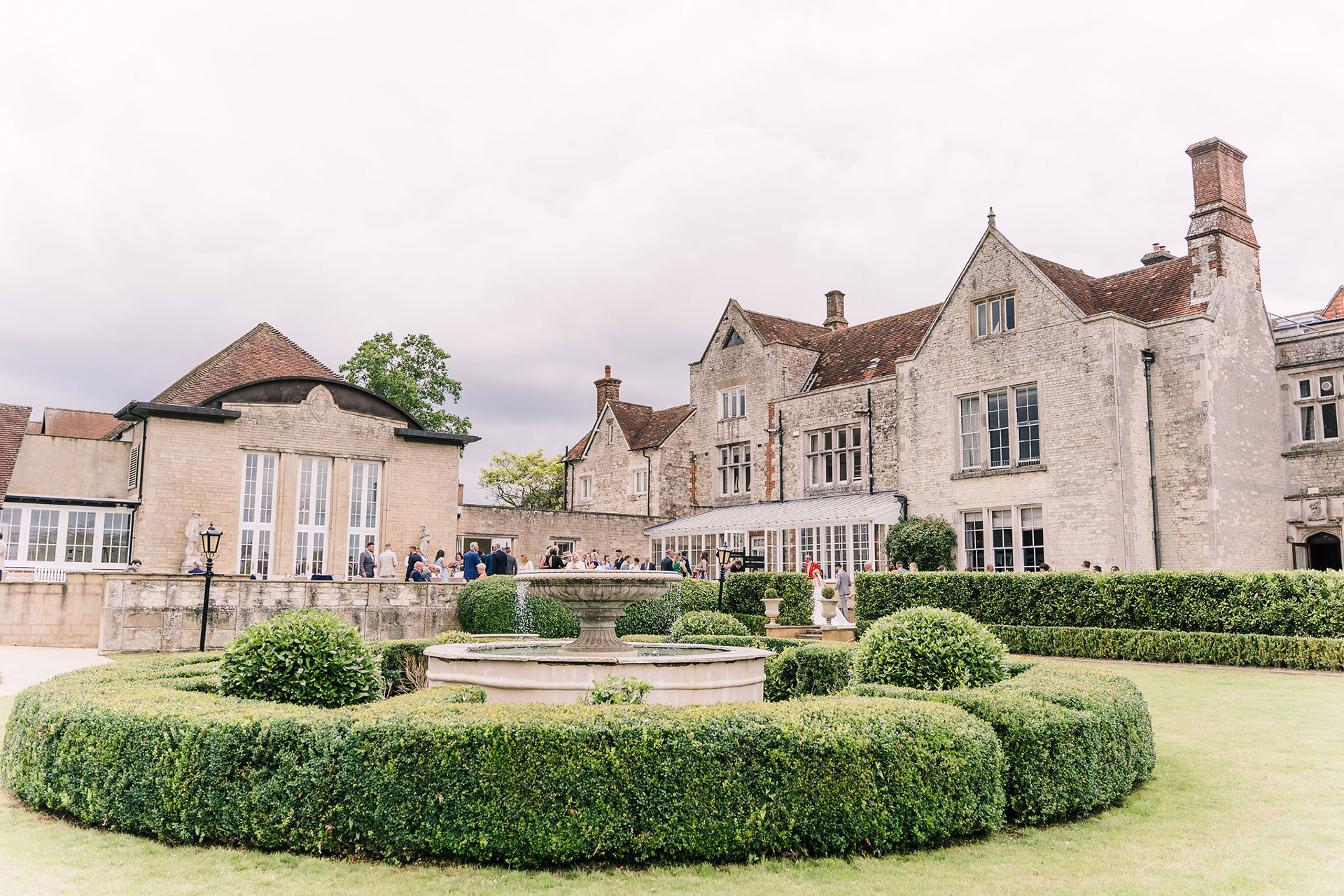 wedding event in gardens outside large country house