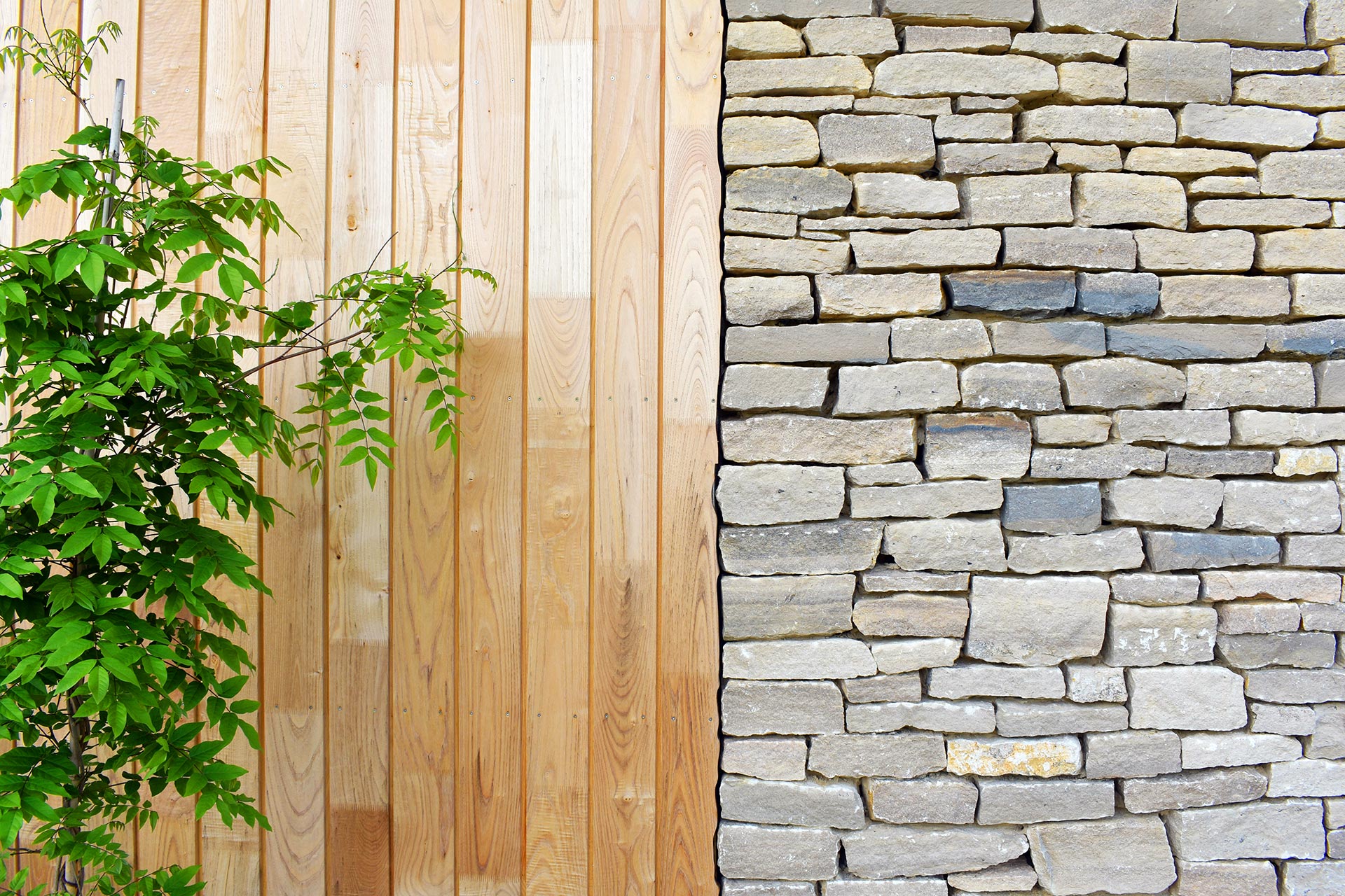detail photo of stone and timber wall joining
