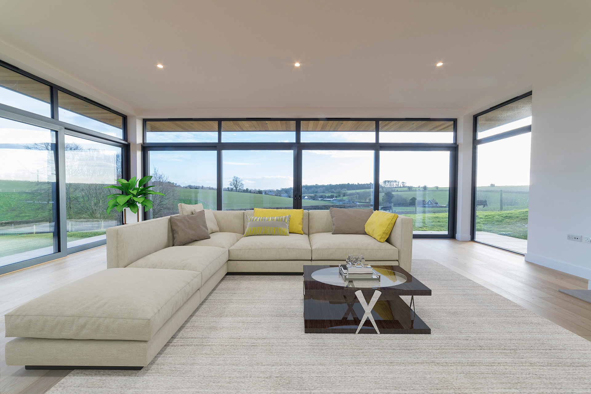 internal living area with large windows looking out to open countryside
