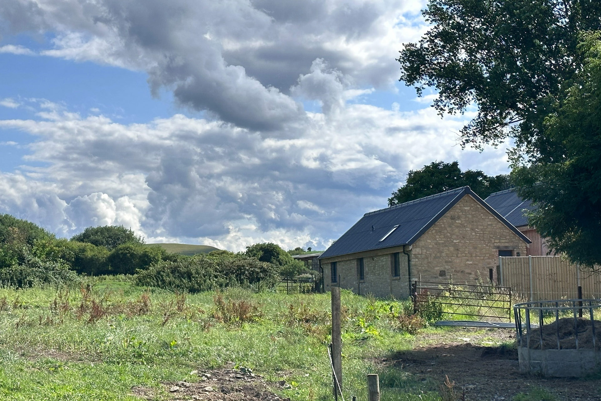 stone walled barn conversion surrounded by countryside